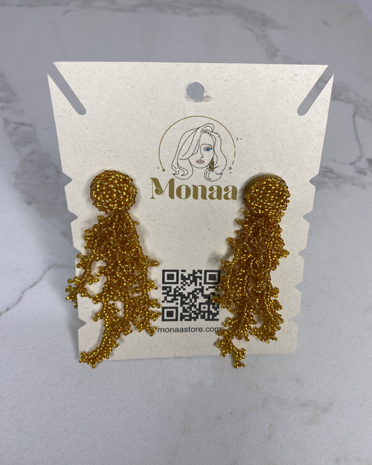 Glamorous Fringe: Gold Beaded Fringe Earrings. Elevate your style with chic sophistication.