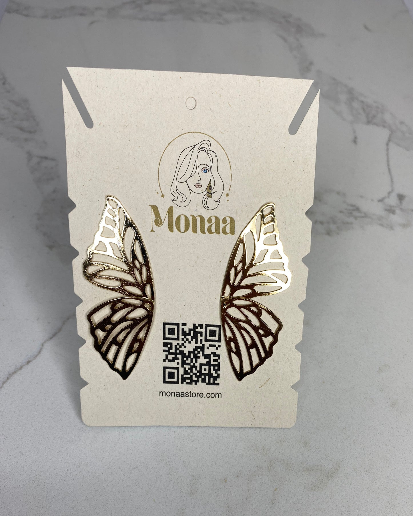 Wings Earrings in Gold. Add a touch of whimsy to your style.